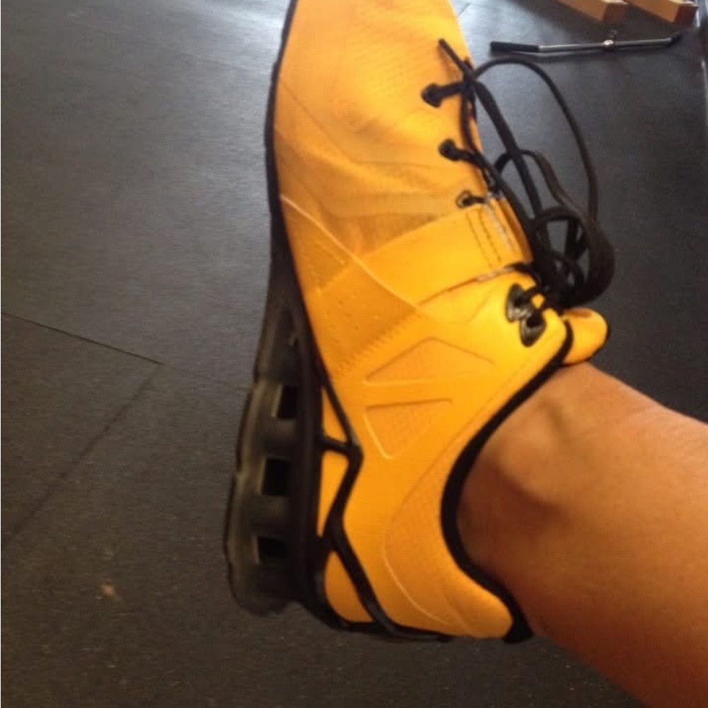 Yellow Athletic Shoes with Black Accents